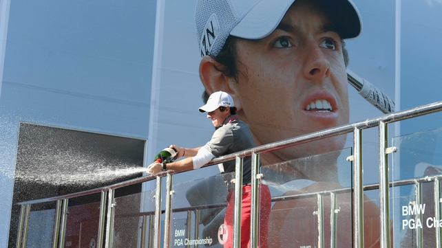 Great end to the week: Rory McIlroy sprays champagne following his victory in the BMW PGA Championship at Wentworth