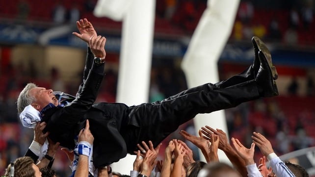 Head Coach, Carlo Ancelotti of Real Madrid is lifted in celebration by his players during the UEFA Champions League Final