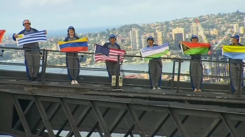 The group also smashed the record for the most people flying international flags at the same time