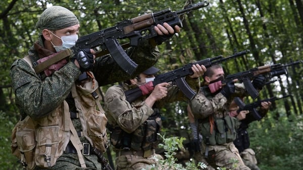 Pro-Russian militants participate in a military exercise at their training base near Donetsk