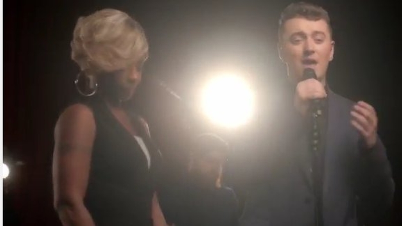 Mary J. Blige and Sam Smith in action