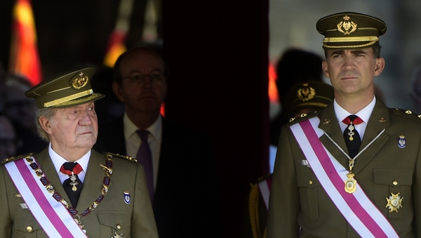 King Juan Carlos and Prince Felipe attending a military ceremony in El Escorial