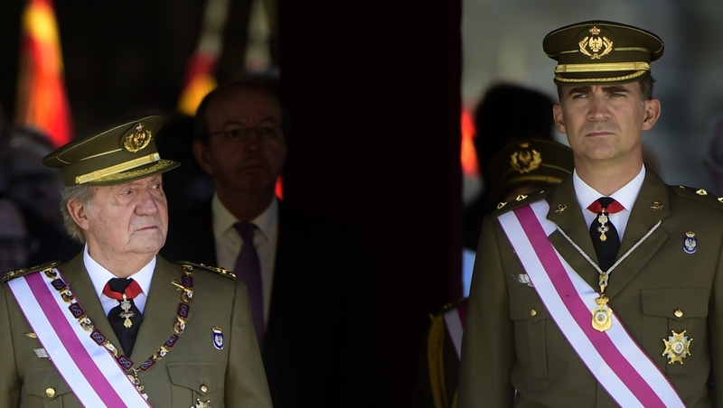 King Juan Carlos and Prince Felipe attending a military ceremony in El Escorial