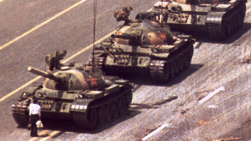 The iconic 'Tank Man' picture which emerged during the protests shows an individual in a white shirt attempt to slow down a column of tanks