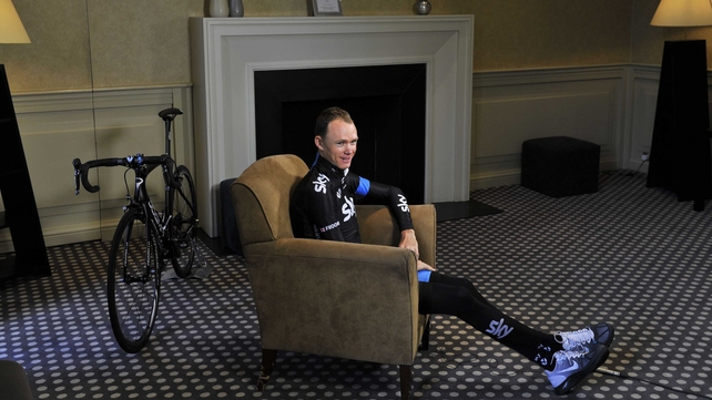 Team Sky's Chris Froome waits in the Rudding Park Hotel during the photocall in Harrogate, before setting off on a training ride