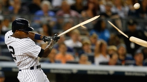 Alfonso Soriano of the New York Yankees breaks his bat fouling the ball off in the sixth inning against the Seattle Mariners at Yankee Stadium