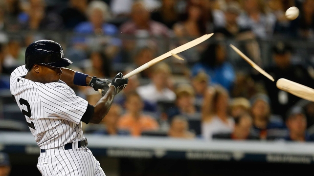 Alfonso Soriano of the New York Yankees breaks his bat fouling the ball off in the sixth inning against the Seattle Mariners at Yankee Stadium
