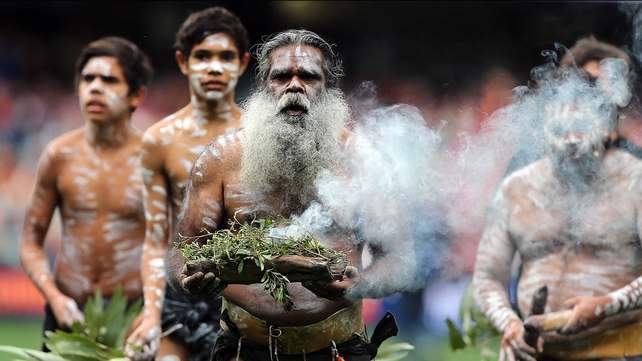 An elder performs the Welcome to Country ceremony during the round 11 AFL match between the Adelaide Crows and the Gold Coast Suns at Adelaide Oval on Sunday