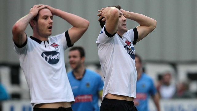 Dundalk's Kurtis Byrne and Brian Gartland react after a missed goal opportunity