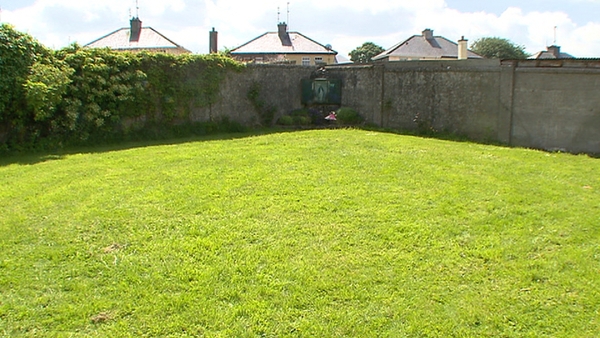 The examination follows reports of an unmarked mass grave at the former mother-and-baby home