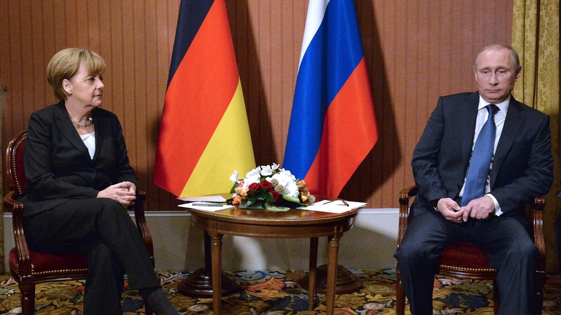 Angela Merkel and Vladimir Putin met on the fringes of the D-Day commemorations