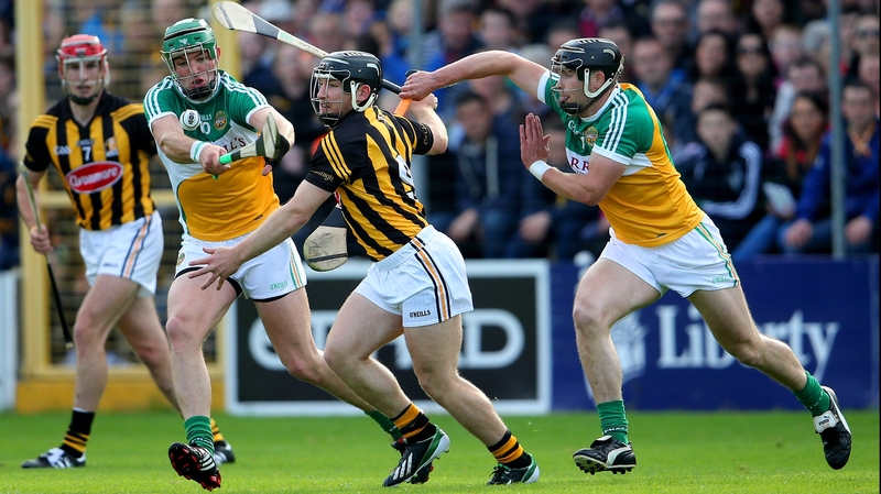 Kilkenny's Richie Hogan with Joe Bergin and Dan Currams of Offaly