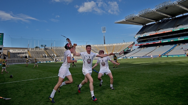 Kildare's Eanna O'Neill (c) celebrates with his team-mates at the final whistle of the Christy Ring Cup final