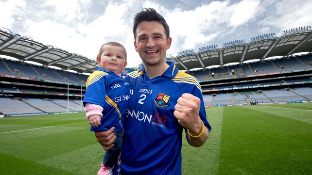 Longford's Conor Egan celebrates with his daughter Elayna after the Lory Meagher final