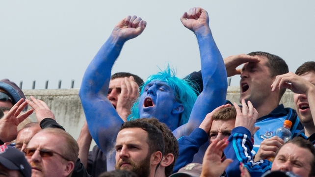 A Dublin fan shows his true colours on Hill 16 on Sunday