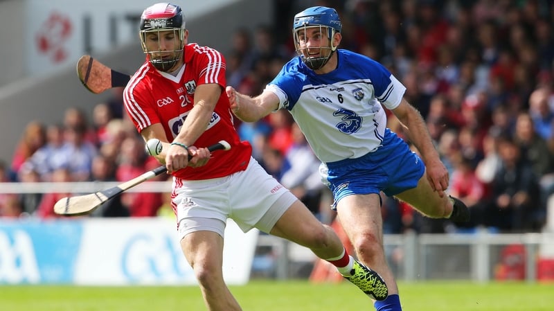 Paudie O'Sullivan in action evading the hook of Waterford's Michael Walsh