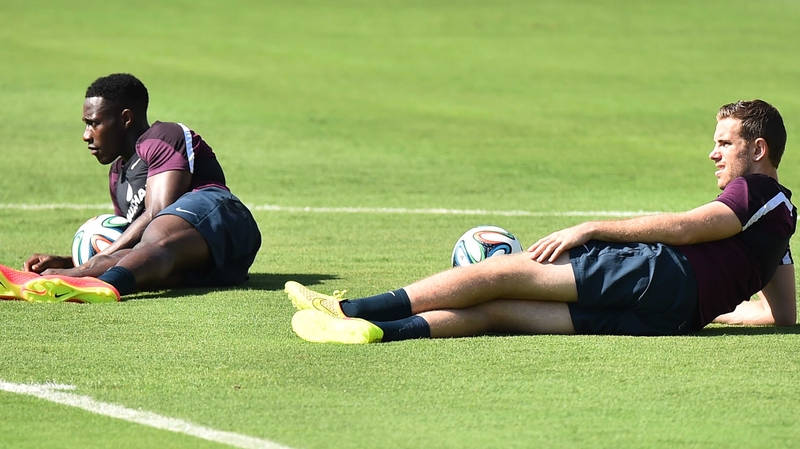 The Manchester United forward (l) reportedly suffered a leg injury and limped out of Tuesday's session