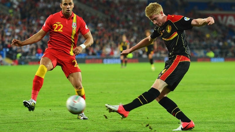 Kevin De Bruyne (R) in action for Belgium