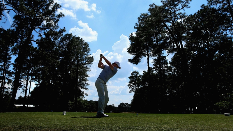 Rory McIlroy hits a tee shot during a practice round prior to the start of the US Open