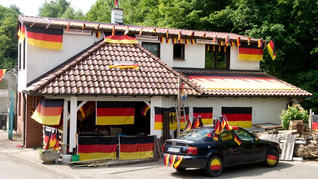 A German home and car are decorated in the country's colours