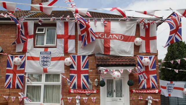 England flags adorn a house on a street in the Knowle West area of Bristol on Wednesday