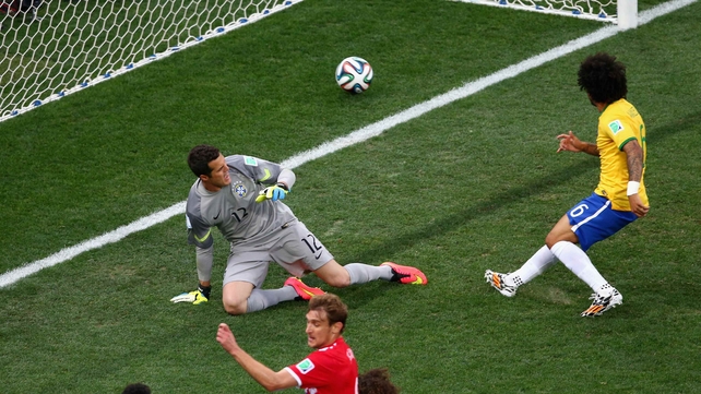 Marcello looks on at his own goal in the eleventh minute