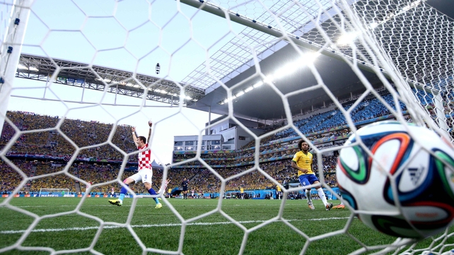 A Croatian player celebrates his team's quick stroke of luck