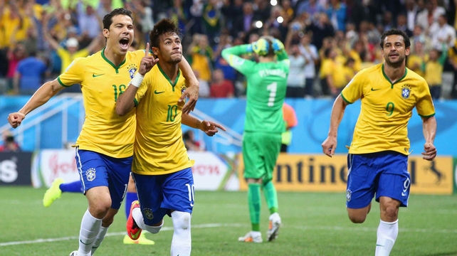 Neymar celebrates with his fellow Brazilians while Pletikosa grieves the goal scored