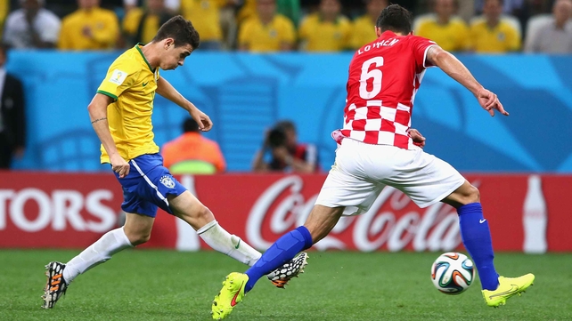 Oscar shoots a toe tap in the box on the left side...