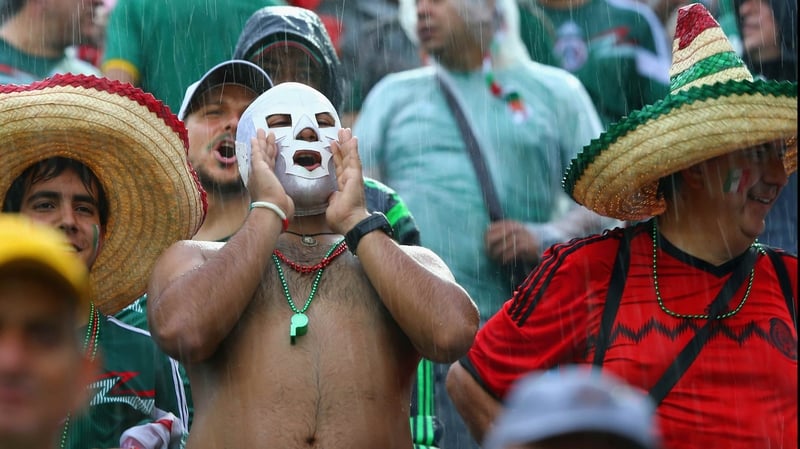 Day 2 of the World Cup was an utter blitz: Mexico persevered through some sketchy calls, Netherlands pounded Spain in a resounding upset and Chile held off a pesky Australia side