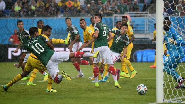 Dos Santos puts the ball in the net once again off a corner...