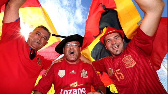 Moving to Salvador, fans of Spain celebrate their squad's impending match against The Netherlands, which began at 2000