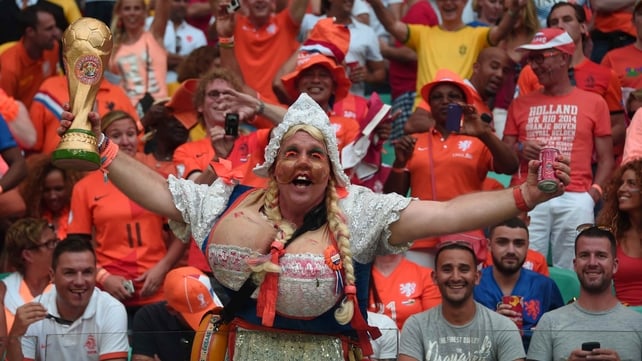 And, not to be outdone, Netherlands fans showed up ready to go, with the World Cup trophy in tow