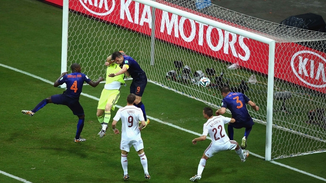 A heavy foul on Casillas by Van Persie - which the referees somehow missed - helped make the goal possible, bringing the score to 3-1 Netherlands