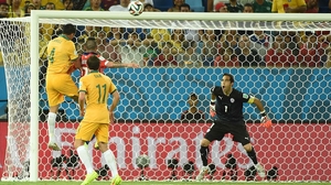 Not out of it yet though, Australia bid their time and came roaring back at 35' with a classic leaping header from veteran forward Tim Cahill