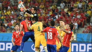 Chile goalkeeper Claudio Bravo worked to hold off the pesky Aussies right up to the end...