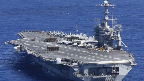 USS George HW Bush moves to the Arabian Gulf ' to protect US lives, citizens and interests' (Pic: EPA)