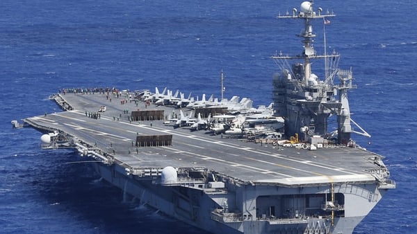 USS George HW Bush moves to the Arabian Gulf ' to protect US lives, citizens and interests' (Pic: EPA)