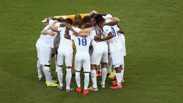 England huddle before their game with Italy