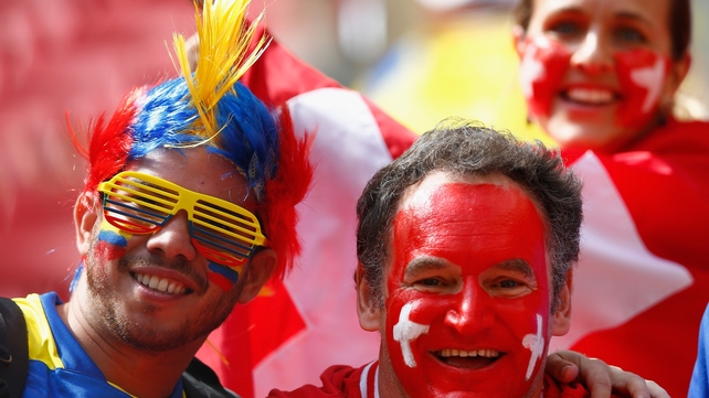 Here we go! Switzerland and Ecuador fans gear up for the game