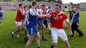 Conor Gormley of Tyrone and Vinny Corey of Monaghan pictured during a fractious end to the Ulster Football Championship quarter-final game