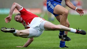 Stephen O'Neill of Tyrone is tackled during the Monaghan versus Tyrone Ulster Football Championship quarter-final