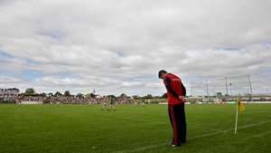 ... and Carlow manager Anthony Rainbow showing a similar dejection on the sideline near the end of the game...