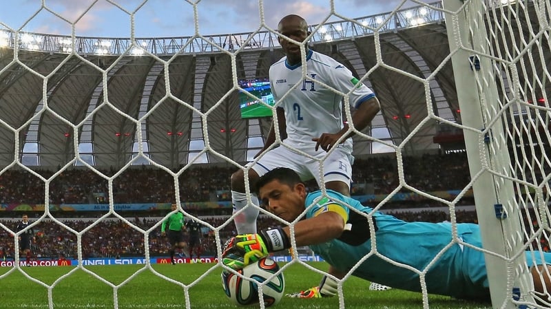 Goalkeeper Noel Valladares of Honduras scores the own goal at centre of GLT confusion
