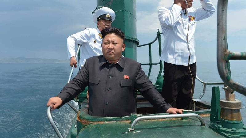 Kim Jong-un pictured in June on board a North Korean navy vessel