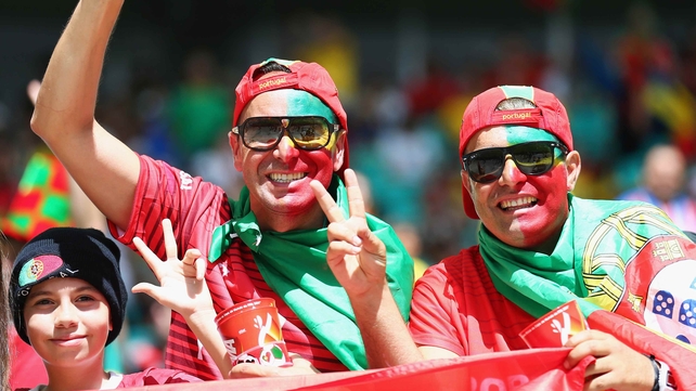 Portugal fans await the kick-off of their team's opening match against Germany
