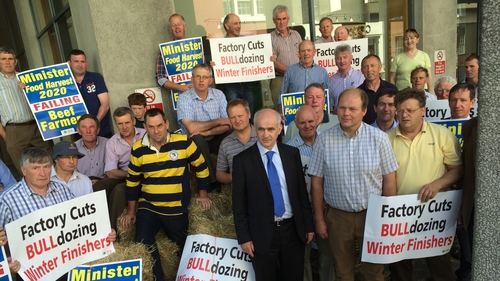 Farmers unloaded hay bales and are staging a protest outside the Dept of Agriculture