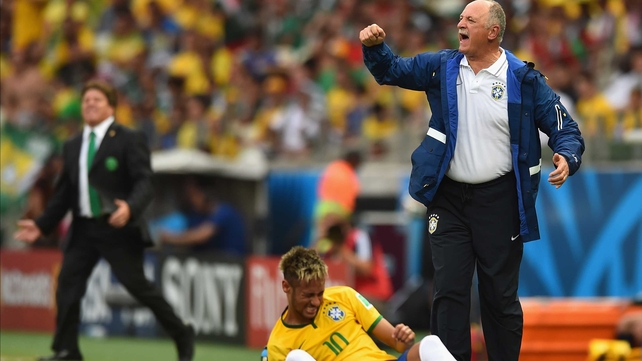 Brazil coach Luis Felipe Scolari gestures toward a banged up Neymar, who couldn't translate his play-making energy into goal-scoring against the well-matched Mexican side