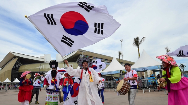 A Korea fan waved this massive flag on his way into the stadium