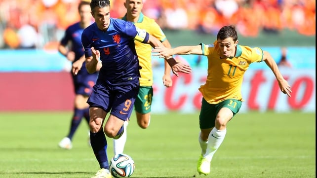 Netherlands forward Robin Van Persie helped his squad off to a fast-paced start, running alongside Australia midfielder Tommy Oar